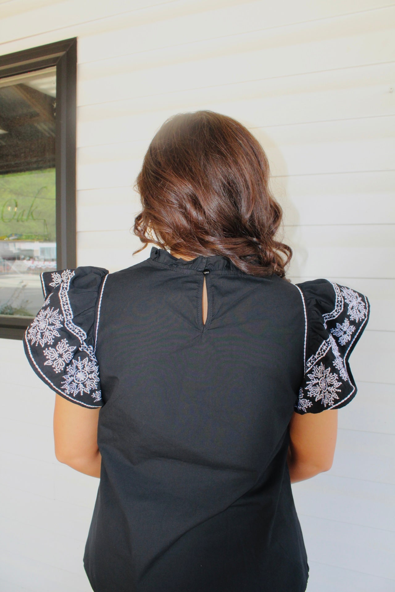 The Payton Black Embroidered Ruffled Sleeve Top